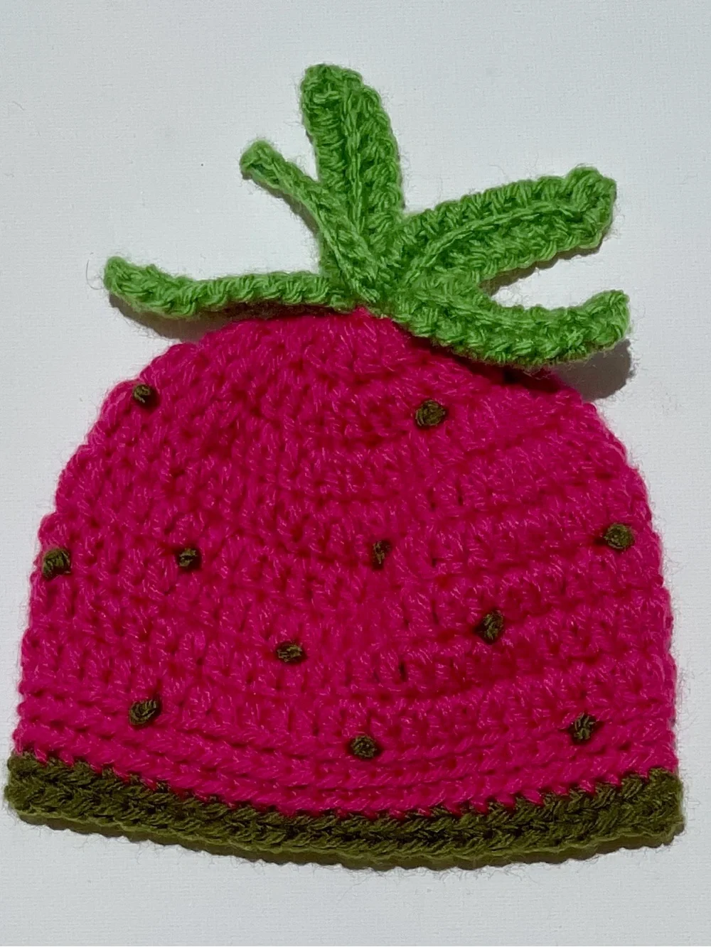 Raspberry Crochet Baby Hat with Green Leaf Accent